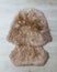 Brown sheepskin fur carpet on wooden floor