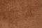 Brown sherpa textured plush fabric material background