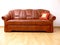 Brown sofa with orient pillow