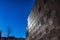 Brown squared metal facade wall on a blue sky