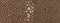 Brown stingray skin texture background, macro. Structure of genuine, natural leather backdrop