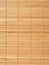 Brown straw mat background vertical view