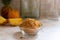 Brown sugar in white ceramic bowl.