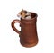Brown Syrian hamster crawls into a large earthenware beer mug