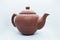 brown teapot isolated background. traditional home living object