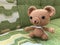Brown teddy bear crochet doll