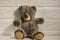 Brown teddy bear sitting alone by the wall, goodbye childhood, abandoned toys