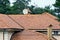 Brown tile on the roof of a large private house