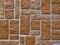 Brown tile with simulated stone texture of different size