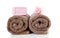 Brown towels and pink soap