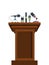 Brown tribune with microphones flat vector illustration