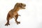 Brown tyrannosaurus rex t-rex, coelurosaurian theropod dinosaur didactic figure with open mouth