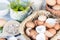 Brown and white eggshells placed in basket in home kitchen on table, eggshells stored for making natural fertilizers or supplement