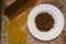 Brown whole wheat pasta in the white plate