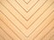 Brown wood background. Chevron natural oak floor pattern texture