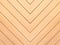 Brown wood background. Chevron natural oak floor pattern texture