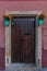 Brown wood entrance door from historical building in Prague Hradcany district