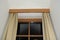 Brown wood windows. Inner construction, design, cotton curtain