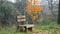 Brown wooden bench with a backrest and feet, juneda, lerida, spain