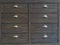 Brown wooden filing cabinets with drawers