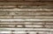 Brown wooden timber planks or boards laid horizontally