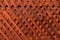 Brown wooden wall lattice background texture.  wooden fence cross pattern. Crossing a tree with nails