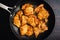 Browned Chicken Thighs with Spanish Seasonings in a Skillet