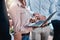 Browsing for some inspiration. Closeup shot of an unrecognizable group of businesspeople working together on a laptop