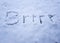 Brrr written in the freshly fallen snow
