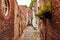Bruges Belgium. Antique brick walls along narrow
