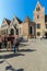 BRUGES, BELGIUM - APRIL 6, 2008: Tourists in front of Sint-Janshospitaal