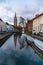 Bruges, Belgium iconic medieval houses, towers and Rozenhoedkaai canal. Classic postcard view of the historic city center. Often r