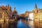 Bruges, Belgium. Image with Rozenhoedkaai in Brugge, Dijver river canal and Belfort (Belfry) tower
