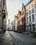 Bruges, Belgium - June 5, 2020, Beautiful historical facades and old brick buildings in the tourist center of the city, small hous