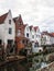 Bruges, Belgium - June 5, 2020, Beautiful historical facades and old brick buildings in the tourist center of the city, small hous