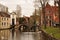 Bruges, Belgium. Old canal front buildings and bridge