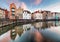 Bruges canals, Spiegelrei with reflection old houses at sunset.