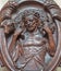 Bruges - The carved relief of Good shepherd on the confession box in Karmelietenkerk