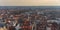 Bruges city skyline with red tiled roofs, Rozenhoedkaai Quay of the Rosary canal and Saint Magdalene Church tower