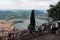 BRUNATE, ITALY - MAY 2016:Tourists on observation deck overwatch Como Lake