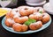 Brunch or lunch. Homemade donuts sprinkled with powdered sugar