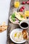 Brunch table. White bean dip and omelette spinach tacos