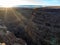 Bruneau canyon and river at sunset with sunburst and flair