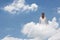 Brunet woman sit on clouds