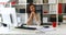 Brunette businesswoman in light office looking at camera.