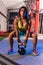 Brunette girl kettlebell swing weightlifting