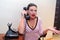 Brunette housewife talking on phone