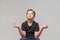 Brunette kid boy sitting meditation on white background