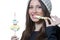 Brunette lady holding a candy skewer