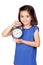 Brunette little girl with a silvered alarm-clock
